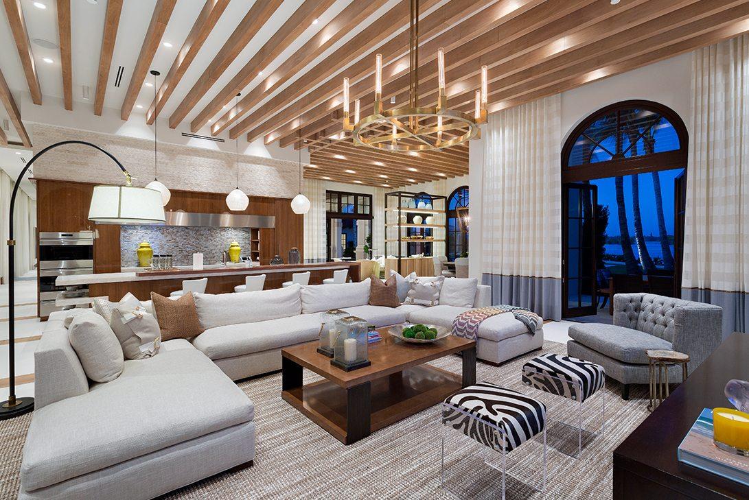 Living Room with Neutral Contemporary Interior Design and high ceilings and large candelabra