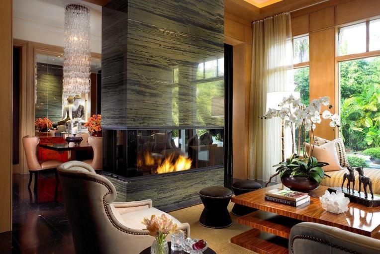 Asian mid-century luxury living room with fire place, chandelier and orchid