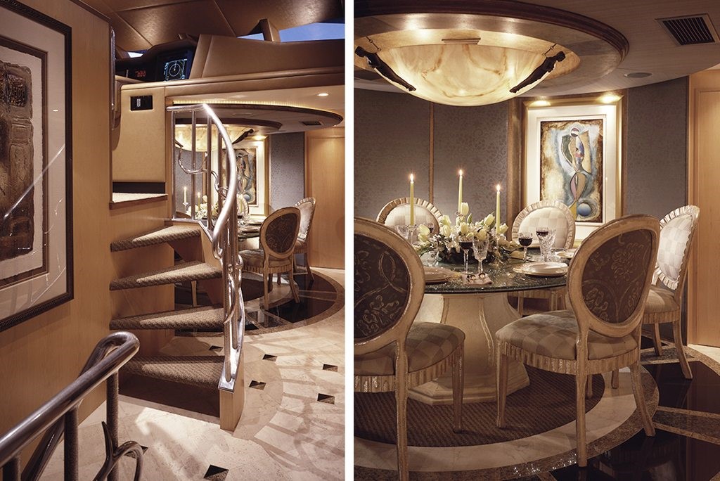 luxury yacht lavish dining room interior with spiral staircase