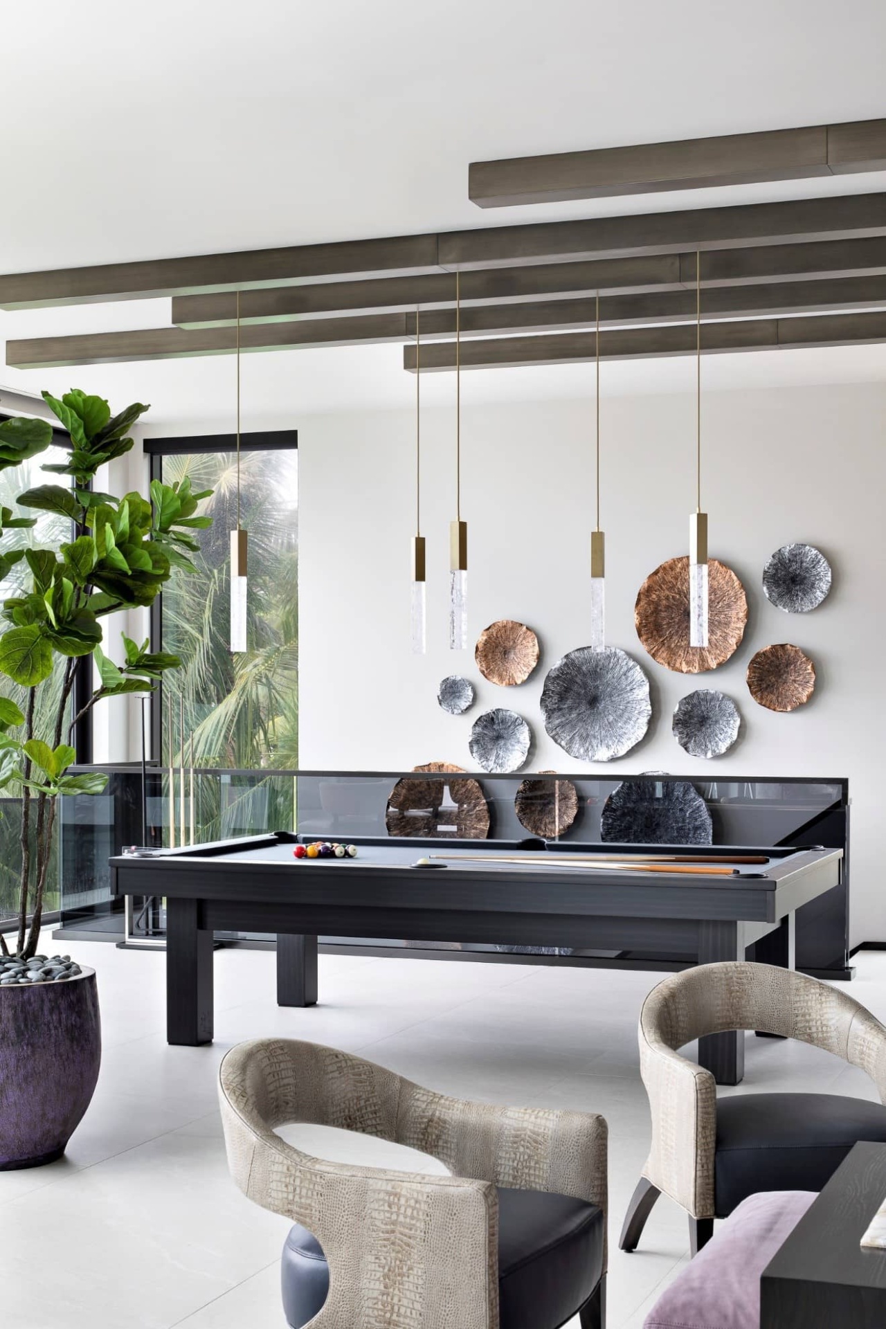 Pool table in a luxurious entertainment space.