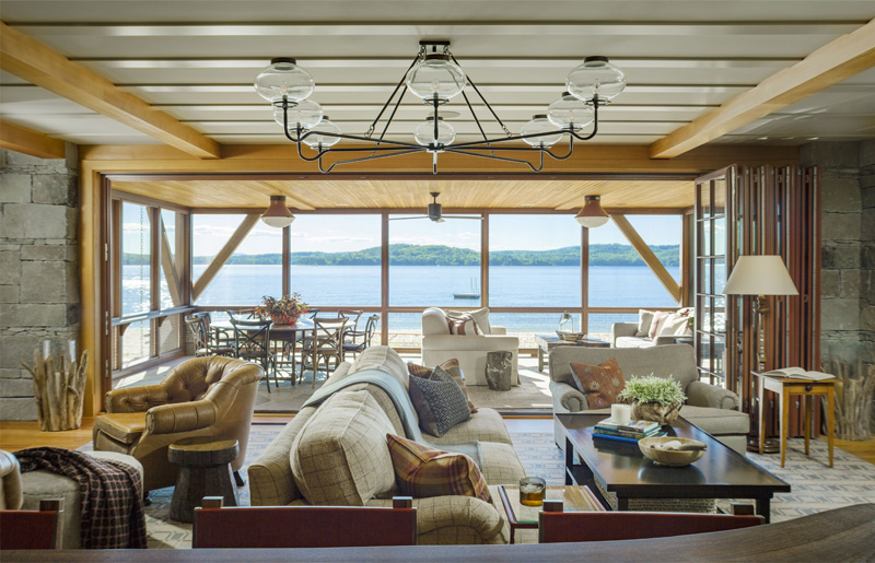 Luxury living room overlooking Lake Sunapee designed by Marc-Michaels Interior Design