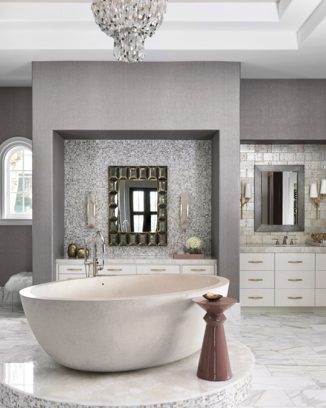 In the primary suite, the most significant transformation took place, as it was previously ultra-rustic and had a compartmentalized layout. The primary bathroom also got a complete facelift, with new finishes and fixtures. The tub in this bathroom now sits elevated on a platform so the client can gaze at the ocean while bathing - another precious view. @modernluxury @jessglynnphoto @jessebratter @rwbdesignbuildlive
