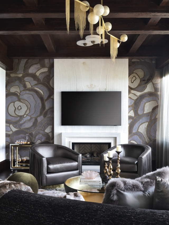 The primary sitting room features a @kylebunting hair-on-hide mural 🖤 Swipe for the before! #beforeandafter #kylebunting #interiordesign #delraybeach #modernluxury