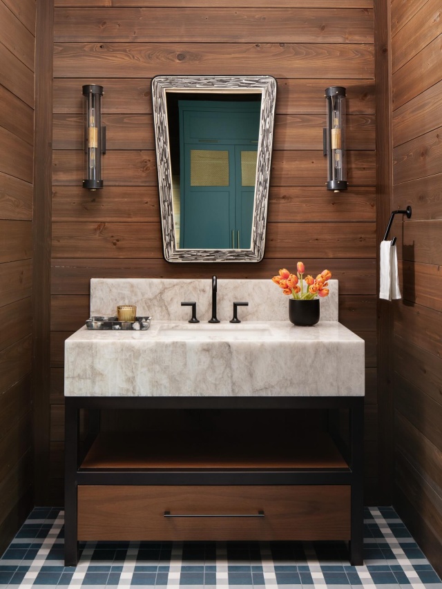 Plaid porcelain tiles bring cozy country charm to this mudroom powder bath. #mudroom #plaidtile #powderbath #rusticmodern #pinecreeksportingclub #ranchdesign #interiordesign