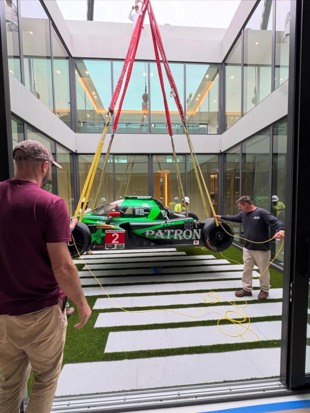 Swipe to see how designers get race cars inside the house 🏎️😬🏁 #vroomvroom #racecar #interiordesign #luxuryhomes #luxurydesign