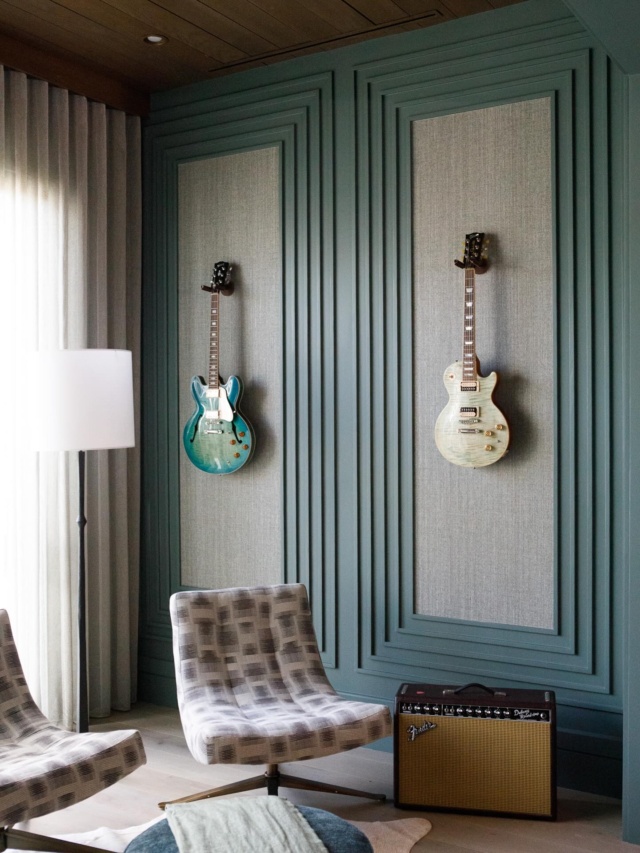 An interior that’s perfectly in tune 🎵 #hisoffice #homeoffice #luxuryhomes #interiordesign #guitarlife Paint color: Rocky River by @sherwinwilliams