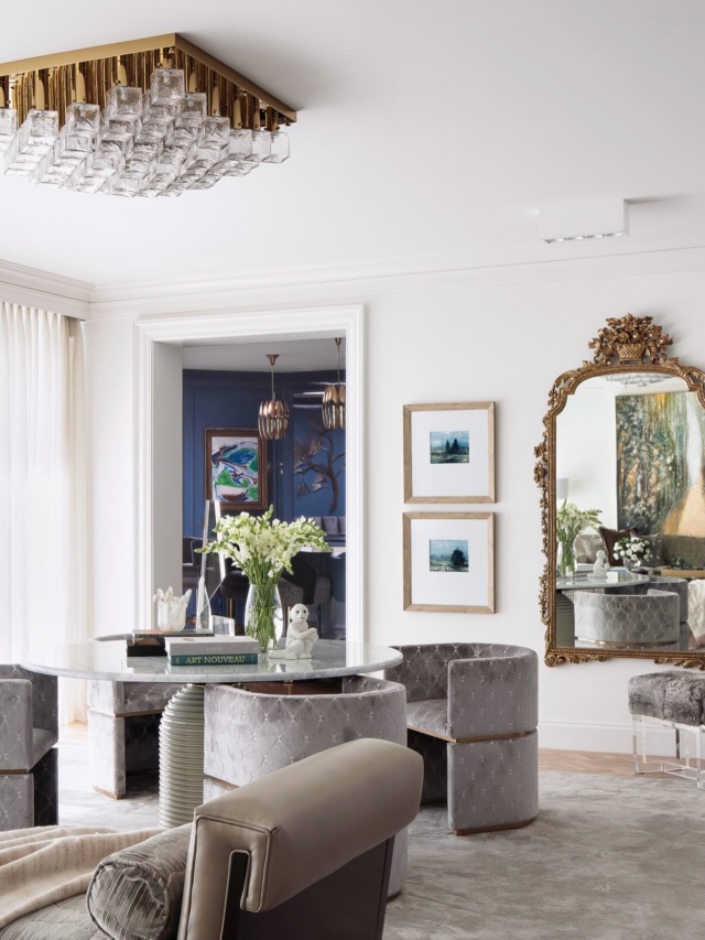 The vast living room features four distinct seating areas, each defined by unique elements. #livingroom #palmbeach #luxuryhomes #cottagesandgardens #interiordesign