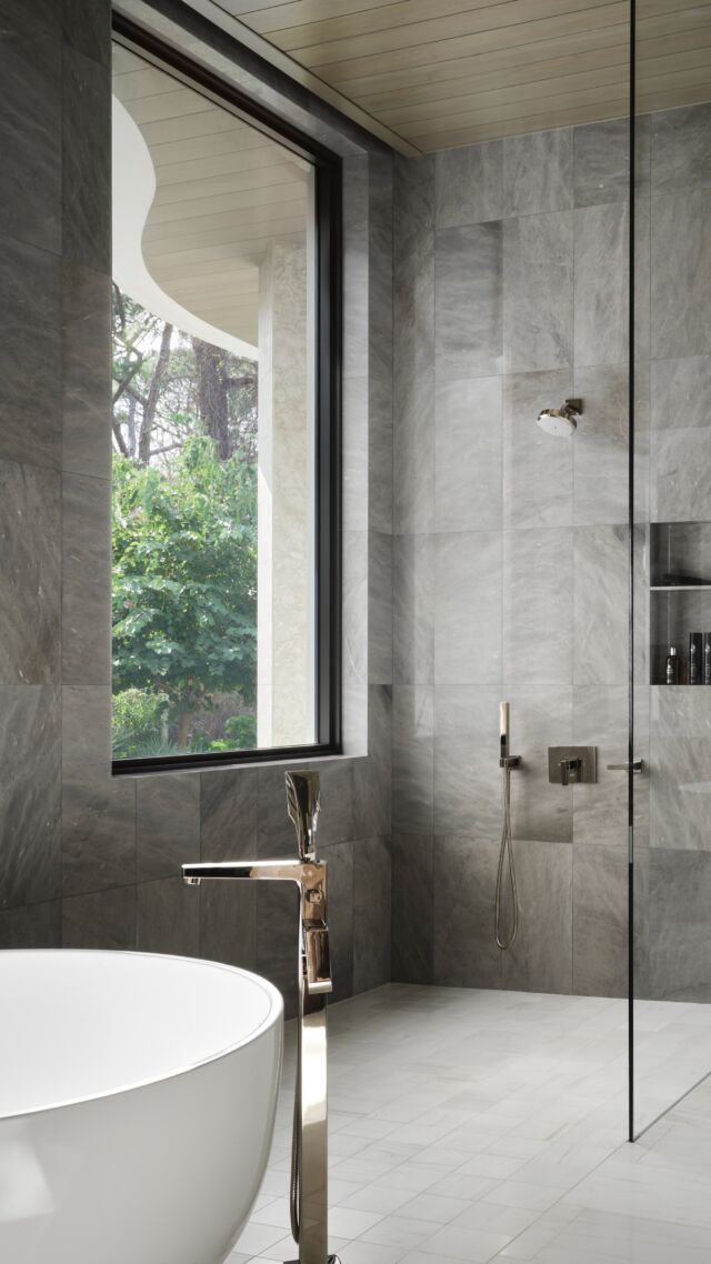 Tub, meet shower. Even the guest bath feels like a spa day—no appointment necessary.